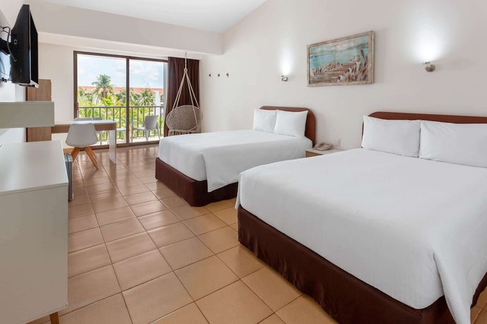 Imagen de la habitación del Hotel Cozumel Hotel & Resort, Trademark Collection by Wyndham. Foto 10