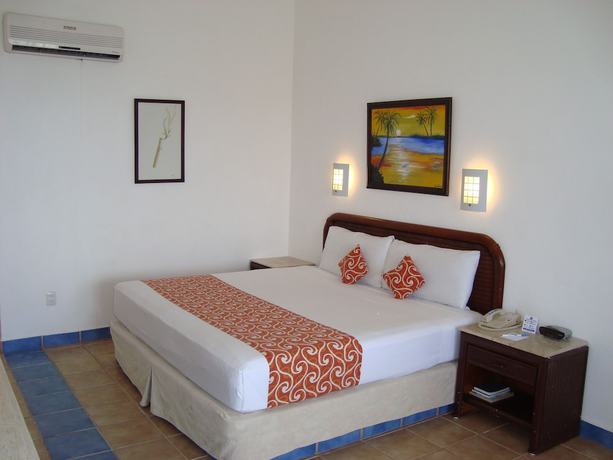 Imagen de la habitación del Hotel Cozumel Hotel & Resort, Trademark Collection by Wyndham. Foto 25