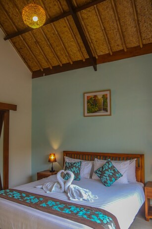 Imagen de la habitación del Hotel Cozy Cottages Lombok. Foto 17