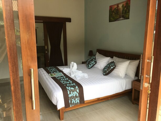 Imagen de la habitación del Hotel Cozy Cottages Lombok. Foto 25