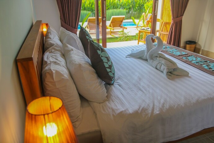 Imagen de la habitación del Hotel Cozy Cottages Lombok. Foto 30