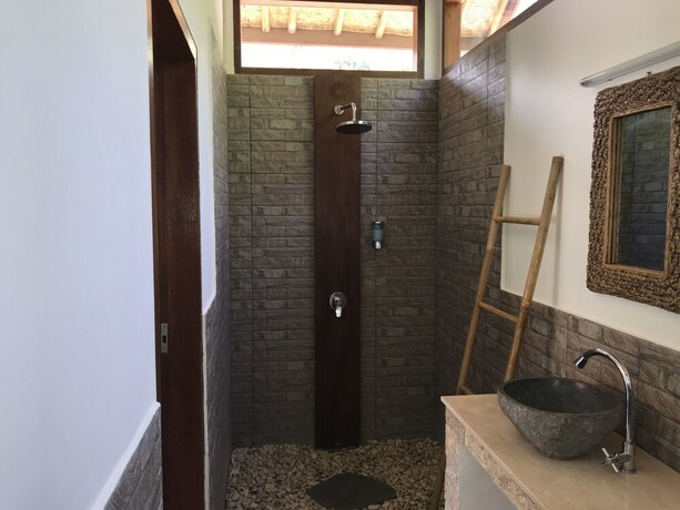 Imagen de la habitación del Hotel Cozy Cottages Lombok. Foto 31