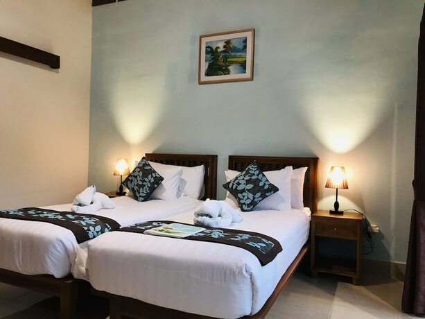 Imagen de la habitación del Hotel Cozy Cottages Lombok. Foto 34