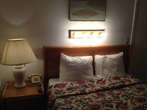 Imagen de la habitación del Hotel Cozy Cove Beachfront Resort Inn. Foto 5