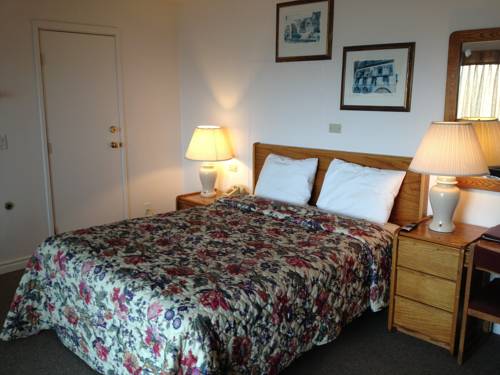 Imagen de la habitación del Hotel Cozy Cove Beachfront Resort Inn. Foto 9