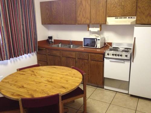 Imagen de la habitación del Hotel Cozy Cove Beachfront Resort Inn. Foto 10
