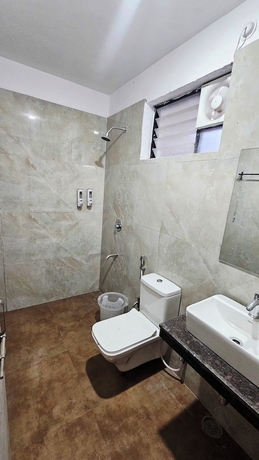 Imagen de la habitación del Hotel Cozy Den. Foto 7