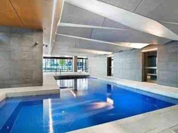Imagen general del Hotel Cozy Gem With Poolgym In Mel Cbd@southerncross. Foto 9
