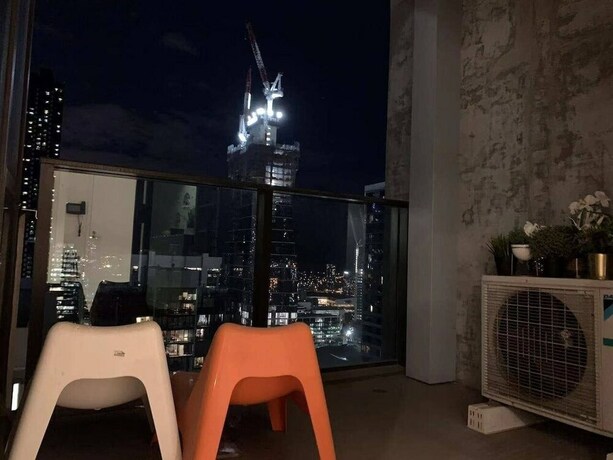 Imagen de la habitación del Hotel Cozy Gem With Poolgym In Mel Cbd@southerncross. Foto 24