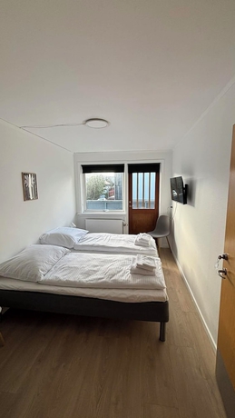 Imagen de la habitación del Hotel Cozy Guest House in T&oacute;rshavn. Foto 16