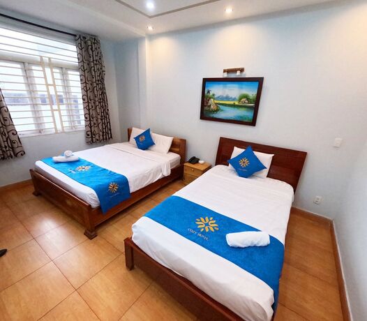 Imagen de la habitación del Hotel Cozy HCM. Foto 15