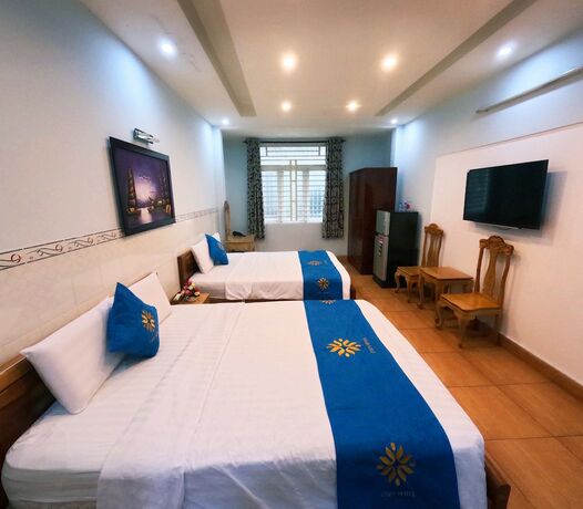 Imagen de la habitación del Hotel Cozy HCM. Foto 18
