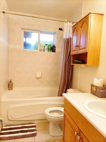 Imagen de la habitación del Hotel Cozy Home in Vancouver. Foto 12