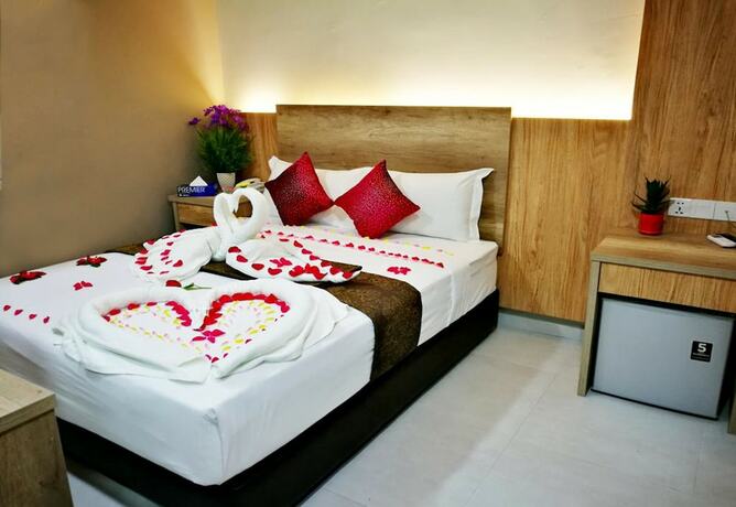 Imagen de la habitación del Hotel Cozy Hotel. Foto 8