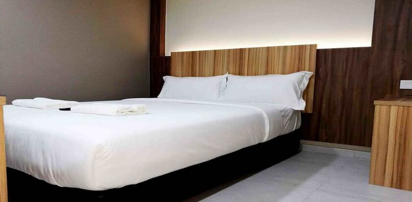 Imagen de la habitación del Hotel Cozy Hotel. Foto 9