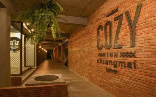 Imagen de la habitación del Hotel Cozy Inn Chiang Mai. Foto 2