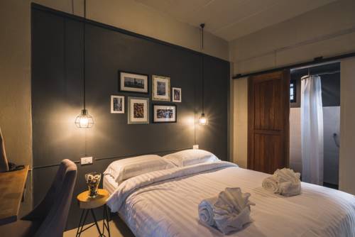 Imagen de la habitación del Hotel Cozy Inn Chiang Mai. Foto 4