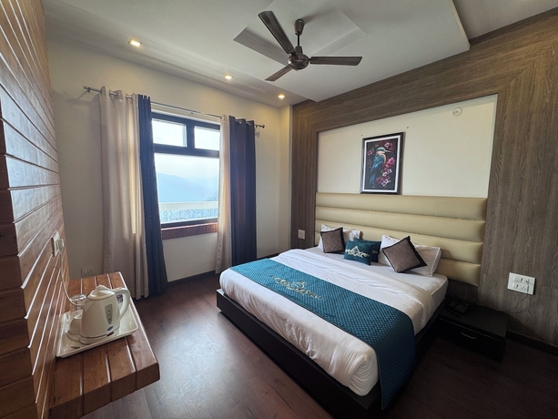 Imagen de la habitación del Hotel Cozy Kanatal And Resort. Foto 11