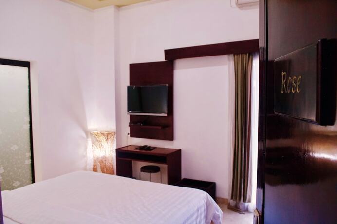 Imagen de la habitación del Hotel Cozy Palm. Foto 13