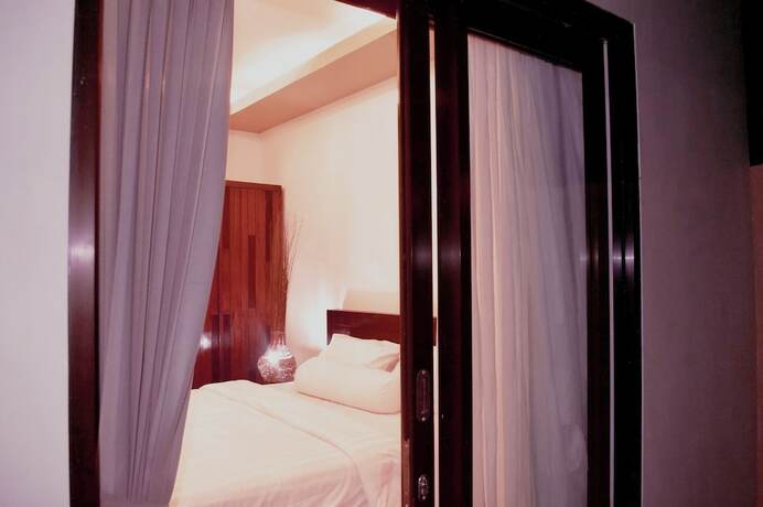 Imagen de la habitación del Hotel Cozy Palm. Foto 15