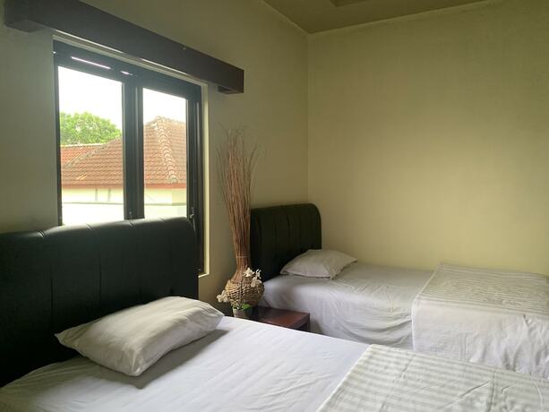 Imagen de la habitación del Hotel Cozy Palm. Foto 16