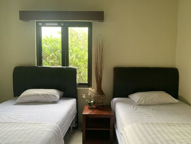 Imagen de la habitación del Hotel Cozy Palm. Foto 17