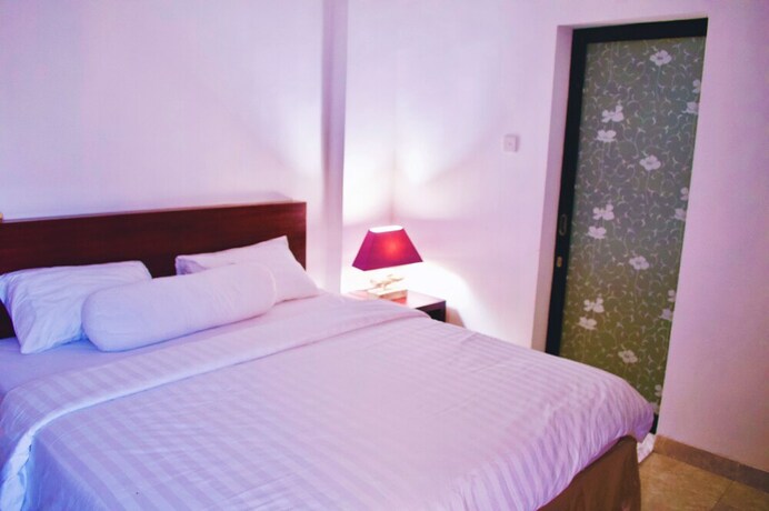 Imagen de la habitación del Hotel Cozy Palm. Foto 18