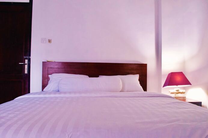 Imagen de la habitación del Hotel Cozy Palm. Foto 19