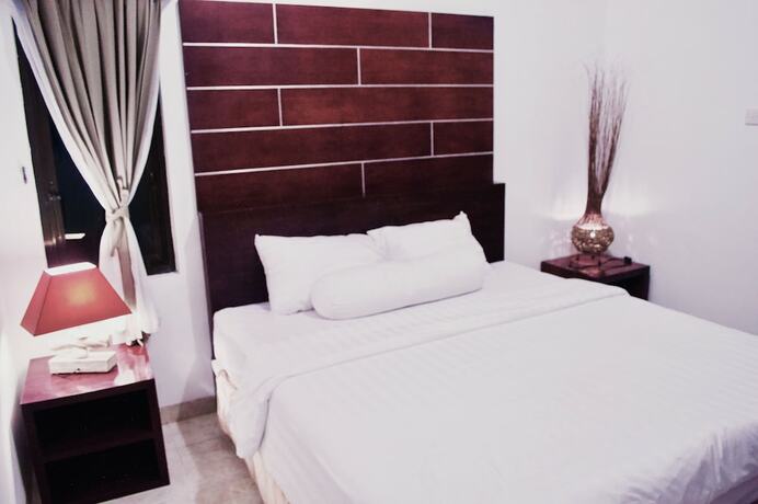Imagen de la habitación del Hotel Cozy Palm. Foto 21