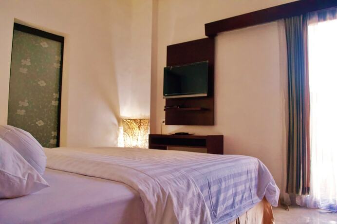 Imagen de la habitación del Hotel Cozy Palm. Foto 23