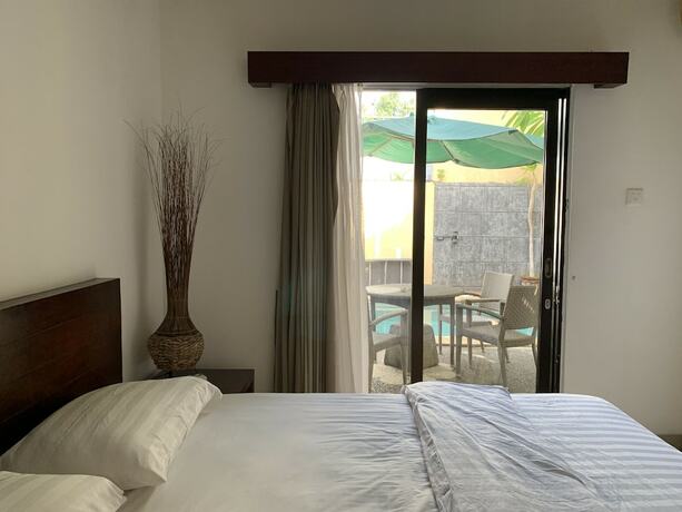 Imagen de la habitación del Hotel Cozy Palm. Foto 24