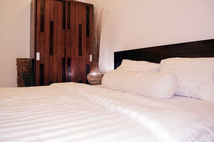 Imagen de la habitación del Hotel Cozy Palm. Foto 26
