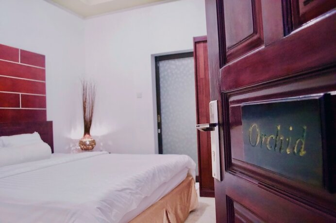 Imagen de la habitación del Hotel Cozy Palm. Foto 27
