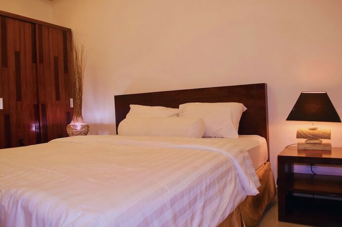 Imagen de la habitación del Hotel Cozy Palm. Foto 28