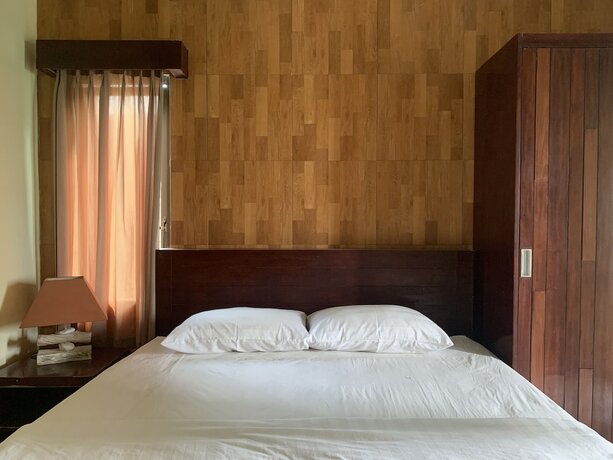 Imagen de la habitación del Hotel Cozy Palm. Foto 29