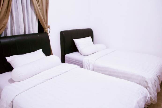 Imagen de la habitación del Hotel Cozy Palm. Foto 30