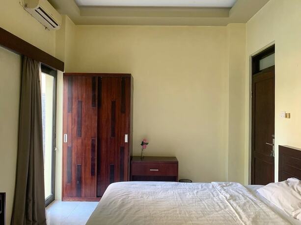 Imagen de la habitación del Hotel Cozy Palm. Foto 31
