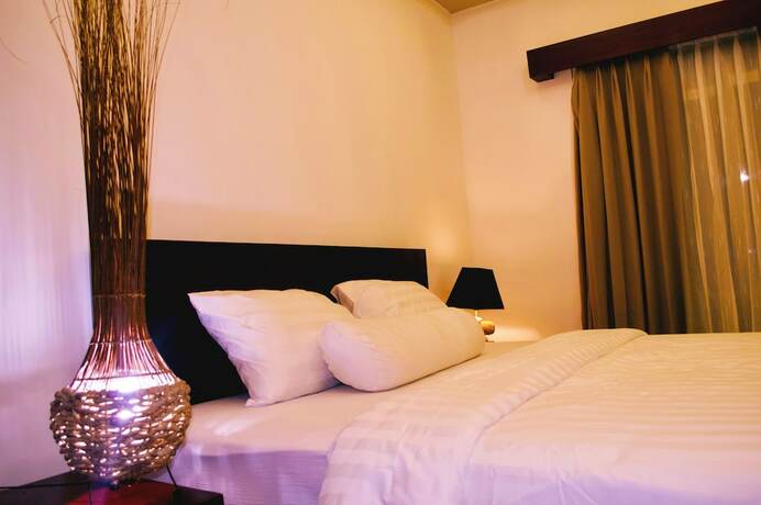 Imagen de la habitación del Hotel Cozy Palm. Foto 33