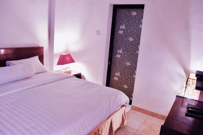 Imagen de la habitación del Hotel Cozy Palm. Foto 35