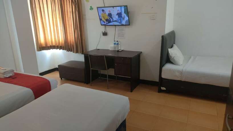 Imagen de la habitación del Hotel Cozy Residence Cipedes Bandung. Foto 9
