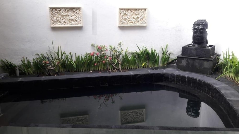 Imagen de la piscina del Hotel Cozy Residence Wedasari Bali. Foto 18