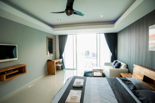 Imagen de la habitación del Hotel Cozy Resort, PATTAYA BEACH. Foto 6