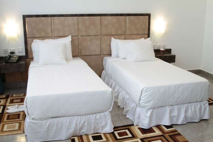 Imagen de la habitación del Hotel Cozy Safari. Foto 15