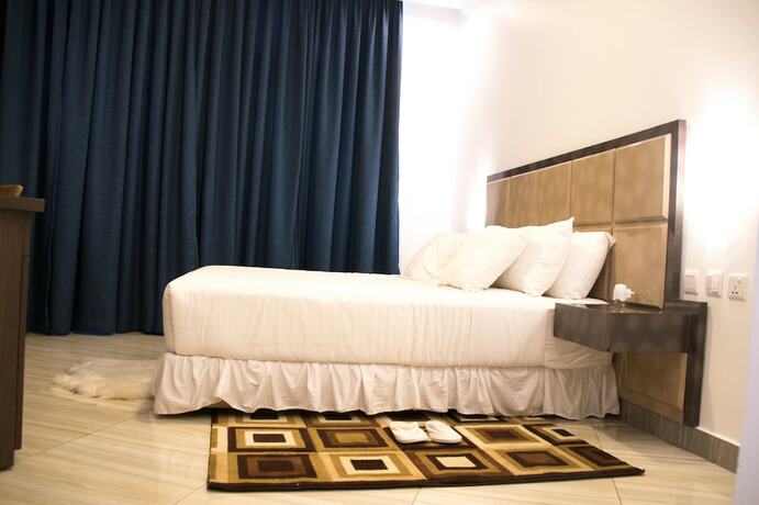 Imagen de la habitación del Hotel Cozy Safari. Foto 17
