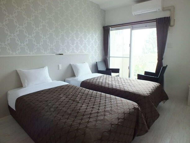 Imagen de la habitación del Hotel Cozy Stay In Itoman. Foto 24