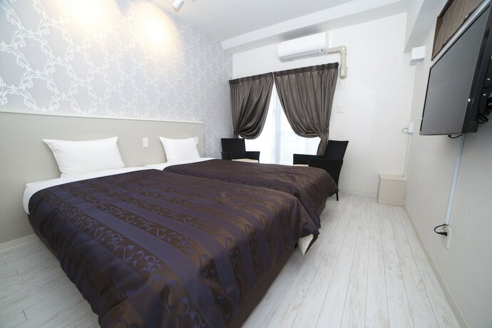 Imagen de la habitación del Hotel Cozy Stay In Itoman. Foto 30