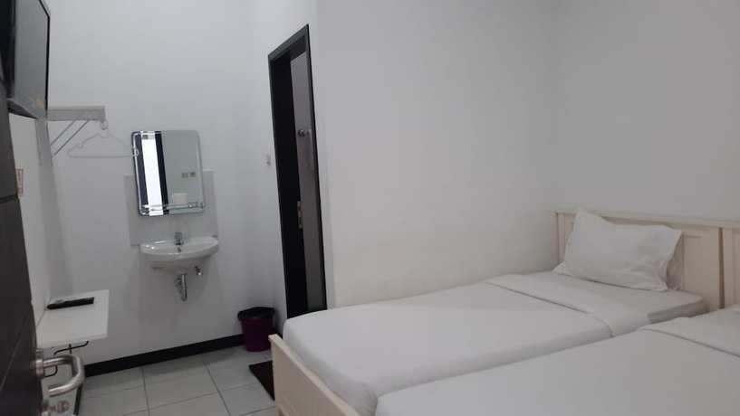 Imagen de la habitación del Hotel Cozy Stay Kupang. Foto 5