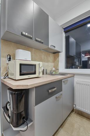 Imagen de la habitación del Hotel Cozy Studio in Militari Residence. Foto 2