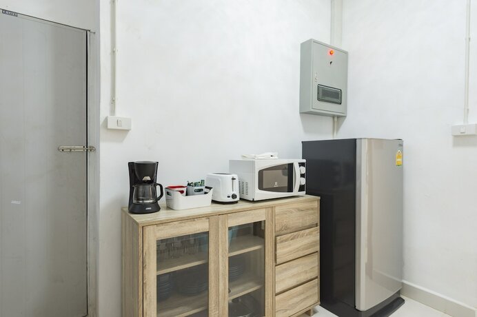 Imagen de la habitación del Hotel Cozy TownHouse HuaLampong. Foto 19
