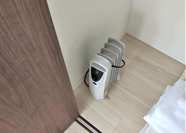 Imagen de la habitación del Hotel Cozy and Convenient Royal Heights. Foto 20